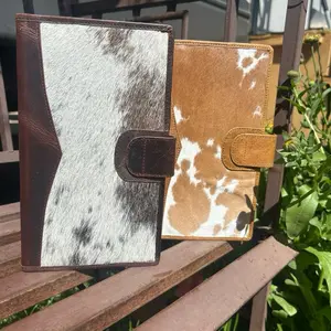 Real Hair on Hide Large Clutch Wallet with Unique Cow Print Design and Brown Leather Accents