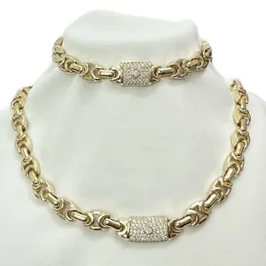 Gold Plated Set Necklace and Bracelet with Decorative Elements and Elegant Design