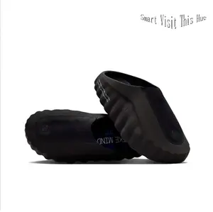 All-Black Perforated Foam Mules, Chunky Slip-On Clogs with Textured Wave Sole, Trendy Streetwear Footwear for Bold Urban Style
