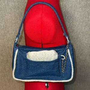 Denim purse with convertible coin wristlet