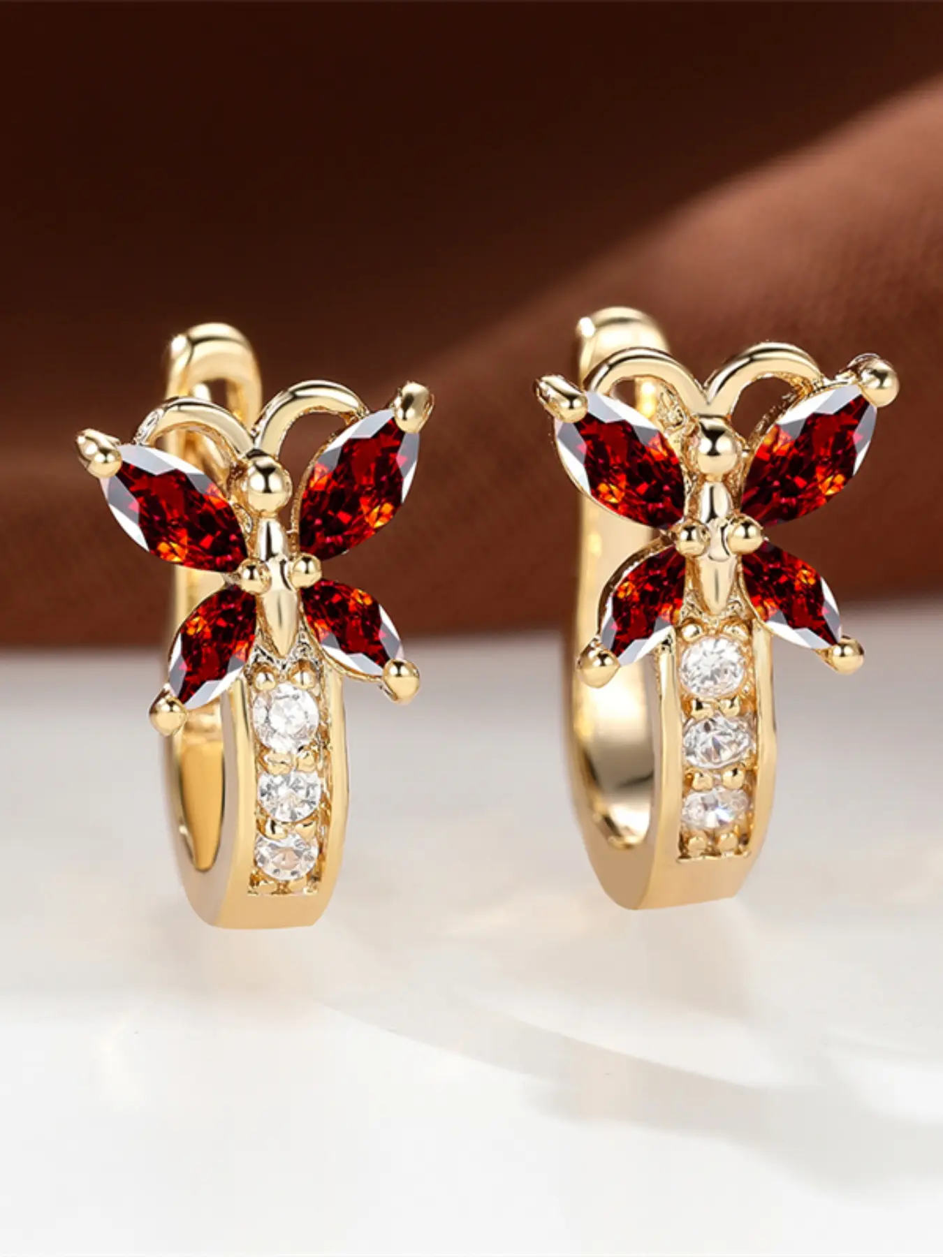 A pair of golden butterfly ear buckles made of red zirconia are fashionable, elegant and retro, suitable for women to wear at travel wedding parties Statement Earrings Earrings Jewelry