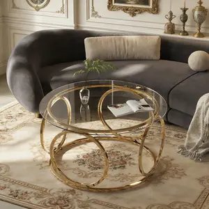 Mesa de centro cuadrada de vidrio de 85 cm, con marco de metal geométrico de lujo, acabado dorado y estante inferior.