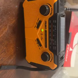 PRUNUS J-369 11100mWh Emergency Weather Radio, AA Batteries/Hand Crank/Solar/USB Charging, NOAA/AM/FM, LED Flashlight and Reading Lamp,SOS Alarm & Flashlight Portable