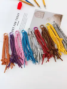 Hand-woven fringed leather pendant, miu series bag hanging, unique, versatile and high-end woven decorative pendant