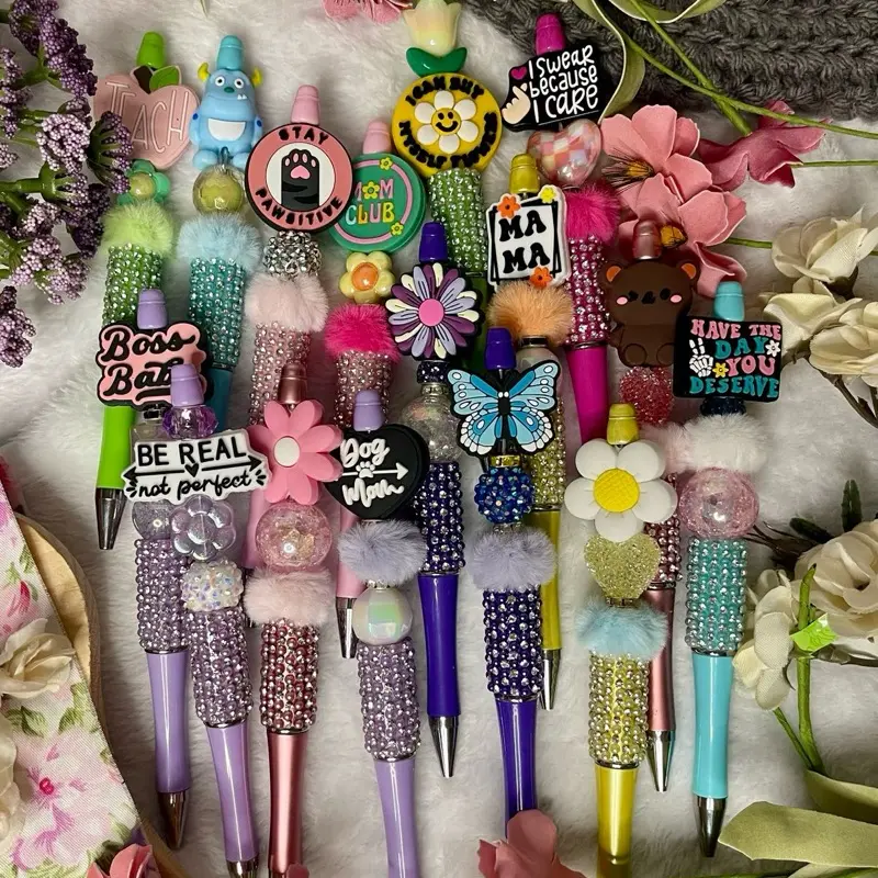 “RHINESTONE/DESIGN LIVE CLAIM” beaded pen