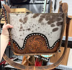 Genuine hand tooled leather & cowhide double concealed carry structured shoulder bag with matching tooled strap