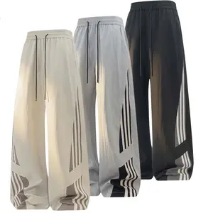 Spring/Summer new men’s design-forward striped wide-leg pants—breathable, drapey, naturally styled casual athletic long pants with a Korean-style three-stripe motif; straight-cut quick-dry sports pants.
