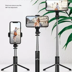 Portable telescopic selfie stick tripod, 360° rotatable and adjustable, equipped with detachable Bluetooth remote shutter, compatible with Apple, Android, and other smartphones, suitable for outdoor, short video, live streaming, and selfie video shooting