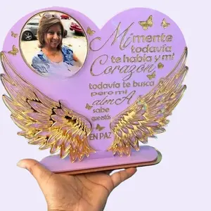 This beautiful heart-shaped memorial with angel wings is a unique keepsake made from high-quality acrylic. Designed to honor a loved one, it includes a personalized photo, name, dates, and a heartfelt message.