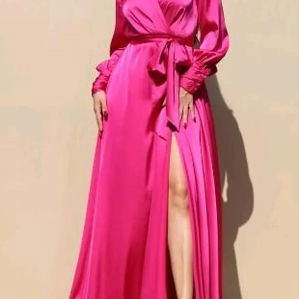 Elegant Fuchsia Maxi Dress with High Slit and Long Sleeves for Special Occasions