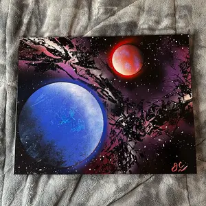 Blue and Red Planets with Galaxy Spray Paint Art - Perfect for Kids' Bedrooms