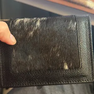 Black leather and hide snap wallet