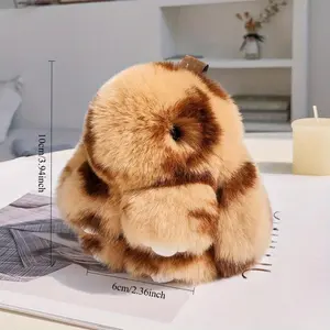 Set of 2 fluffy bunny paw keychains — blue, purple, and warm brown stripes; adorable rabbit-shaped charms with sparkling details; perfect for Valentine’s Day, birthdays, and more; ideal as gifts; playful design; sparkling detail; bunnies