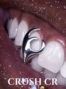 CRUSH CR 1pc 18K Gold Plated Edgy Curved Flame Tooth Grillz, Bold Sleek Metal Design, Gold/Silver Options, Perfect For Hip Hop Concerts, Club Nights Streetwear Styling, Halloween Vampire Costumes, Unisex Dental Accessory For Men Women Female Girl