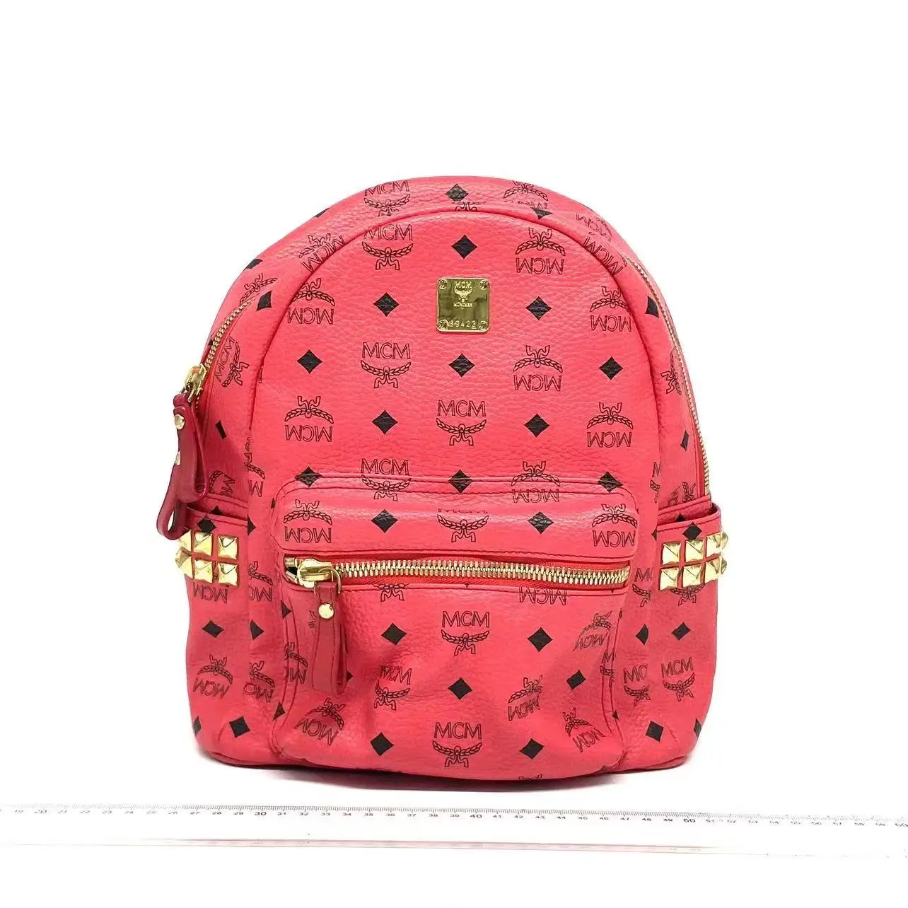 Pre-owned MCM canvas Backpacks Backpack Red with Gold Hardware and Logo Pattern