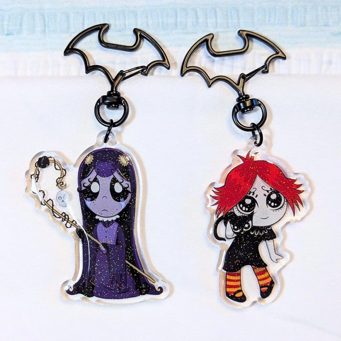 2 ops Gloomy Girl Glitter Acrylic Keychain