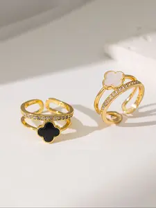 A minimalist, niche, light luxury women's ring with a diamond-studded four-leaf clover design, fashionable and creative, gold-plated with zircon, adjustable, Gift Jewelry. Suitable for parties, gifting to friends and family, or daily wear.