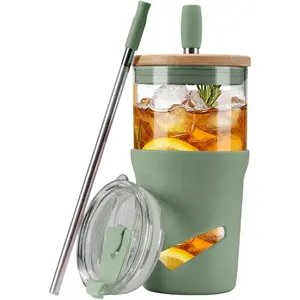 Eco-friendly 20oz Glass Tumbler with bamboo lid, 2-in-1 straw & anti-slip silicone sleeve. Perfect for iced coffee, smoothies & more! Durable, stylish & great for on-the-go hydration