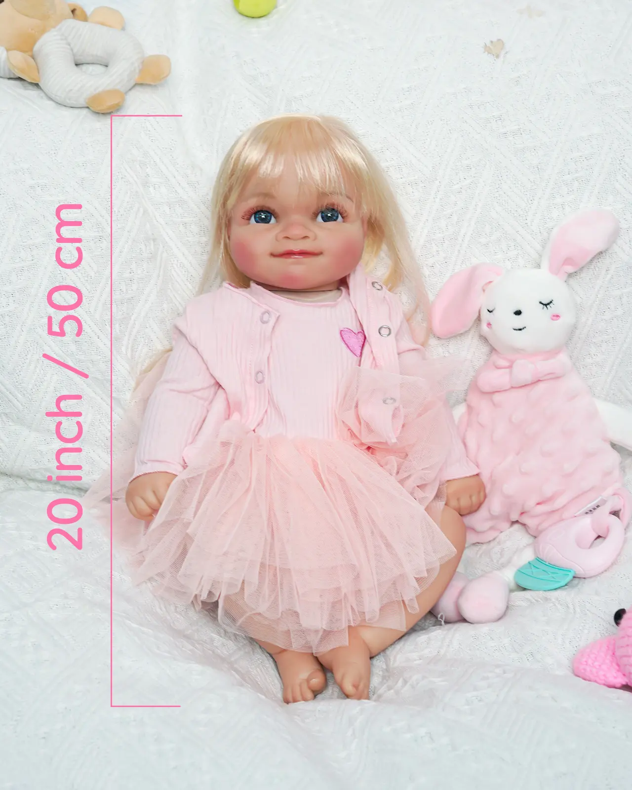 VACOS 20inch Reborn Baby Doll: Soft vinyl body with golden twin ponytails, blue eyes, pink outfit with heart embroidery & tutu skirt—perfect for gifting on special occasions!