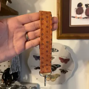 Mini Suns on Burnt Orange Fabric Keychain Wristlet