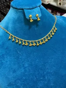Golden necklace tanmaniya