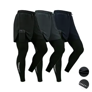 A set of fake two piece high elasticquick drying sports pants for fitness and training,suitable for men who like to lift iron. The pants aredesigned to be tight and feature a phone storagepocket. The fabric is double layered with adrawstring waist. I