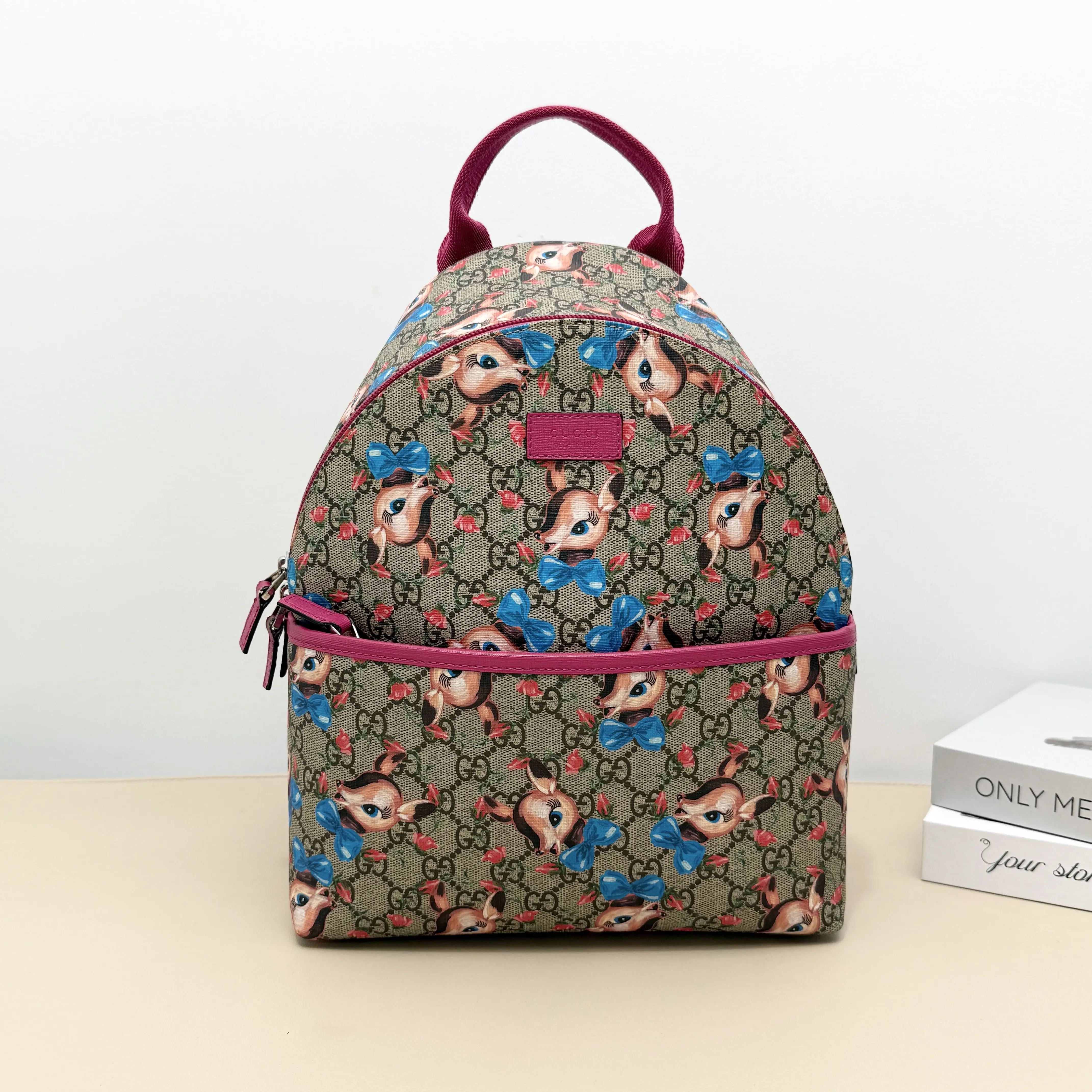 Pre-owned GUCCI Coated Canvas Backpacks GG Supreme Bambi Deer Print Backpack with Fuchsia Leather Trim B8062902