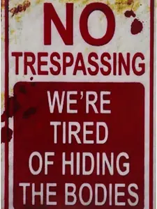 Spooky Halloween Sign – Retro and Stylish Metal Tin Décor. Add a Touch of Humor with Our ‘No Trespassing, We’re Tired of Hiding the Bodies’ Sign