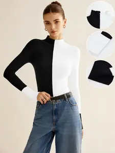 Fashionable and eye - catching, black - and - white spliced turtleneck knitted piece Knitwear. The dressing atmosphere is fully enhanced. Women's clothing, new autumn and winter bottoming sweater for ladies