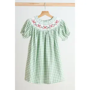 Green bow tie hand smocked gingham dress
