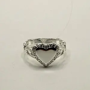 Heart-Shaped Ring with Intricate Greek Key Design in Silver Tone