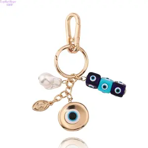 Evil Eye Keychain - Protective Amulet, Boutique Style Keychain Accessories, Compact Charm Decoration, Bag Charm for Daily Use, Stylish Functional Keyring for Men-Women, Charm Decoration Keychains