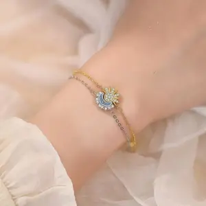 A set of exquisite gold and silver layered bracelet with crystal adjustable chain for her romantic gift, a double layered bracelet with adjustable sparkling crystal bow bracelet, and a wedding anniversary jewelry gift