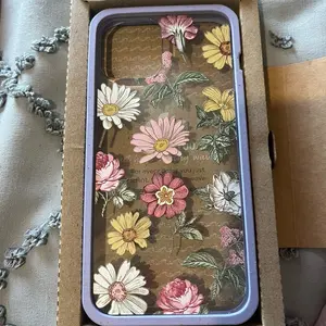 Pela Earth IPhone Pro Max Clear/Floral Case new in box.