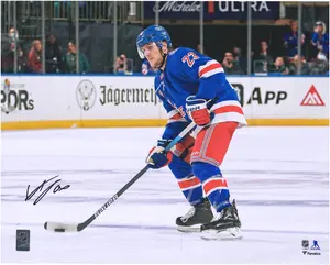 Adam Fox New York Rangers Autographed 16" x 20" Blue with Puck Photograph - Fanatics Authentic Certified