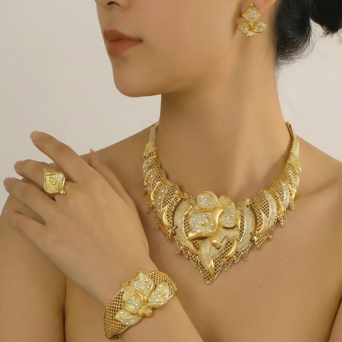 LQ 4-Piece Dubai's Luxury Gold Crystal Jewelry Set - Twisted Mesh Statement Necklace, Bracelet, Earrings & Ring - 18K Gold Plated Floral Gift for Weddings & Mother's Day Unique, confident and beautiful