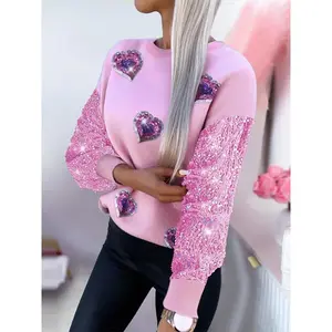 Women’s long-sleeve pullover sweatshirt with a heart-shaped patch, crew neck, and sewn sequin sleeves; casual women’s spring and autumn apparel.