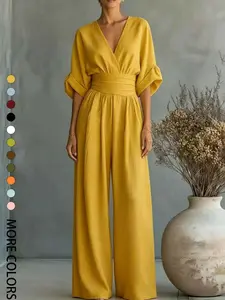 Summer new fashionable and high-end V-neck one-piece wide leg pants with cinched waist for slimming effect. Bubble sleeve design is suitable for daily travel, outdoor lawn banquets, light wedding outfits, afternoon tea, commuting