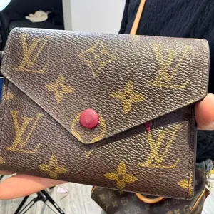 Pre-owned Louis Vuitton canvas Clutches & Wristlets victorine wallet