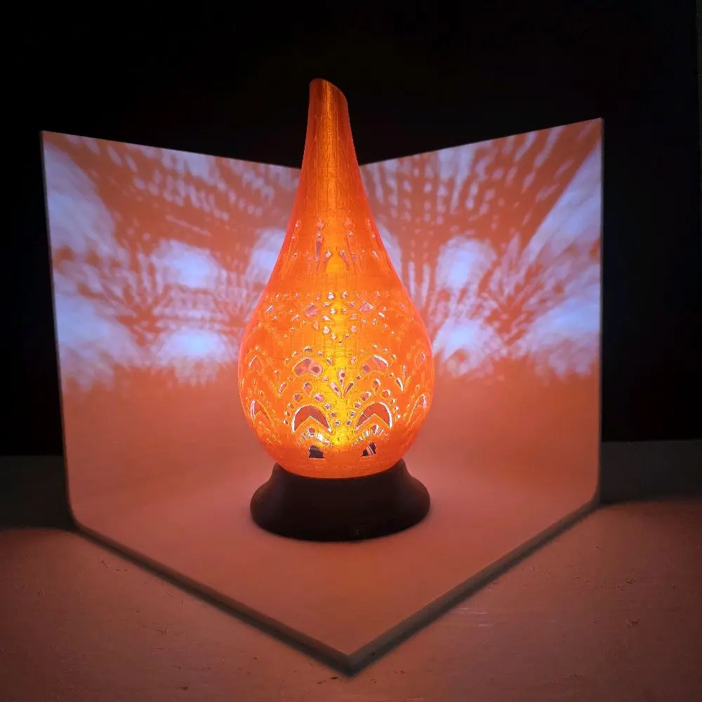 Teardrop Style Table Lamp with Translucent Red Glow, Elegant Design, Ideal for Home Decor