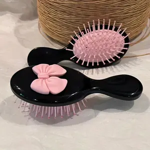 Cute Bow Mini Hairbrush - Portable Folding Cushion Comb with Air Bag, ABS Plastic Handle and Bristles, Suitable for Normal Haircut, Massage Hairbrush with Pink Bow Design, Hair Styling Tool, Playful Aesthetics, Soft Cushion Grip