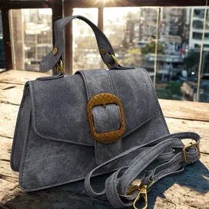 Elegant Jean Handbag with Gold Accents Secure Closure for Everyday Use Stylish and Durable