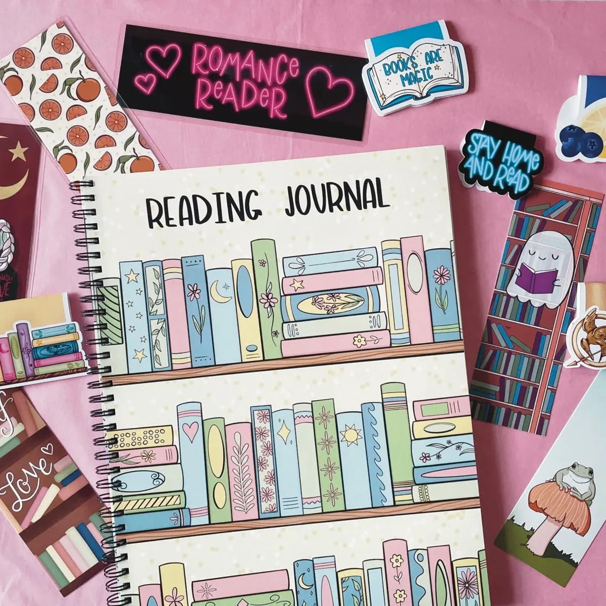 Reading journal grab bag, includes a Yellow book review journal with 50 review pages, 5 mystery traditional bookmarks and a pad of post it notes