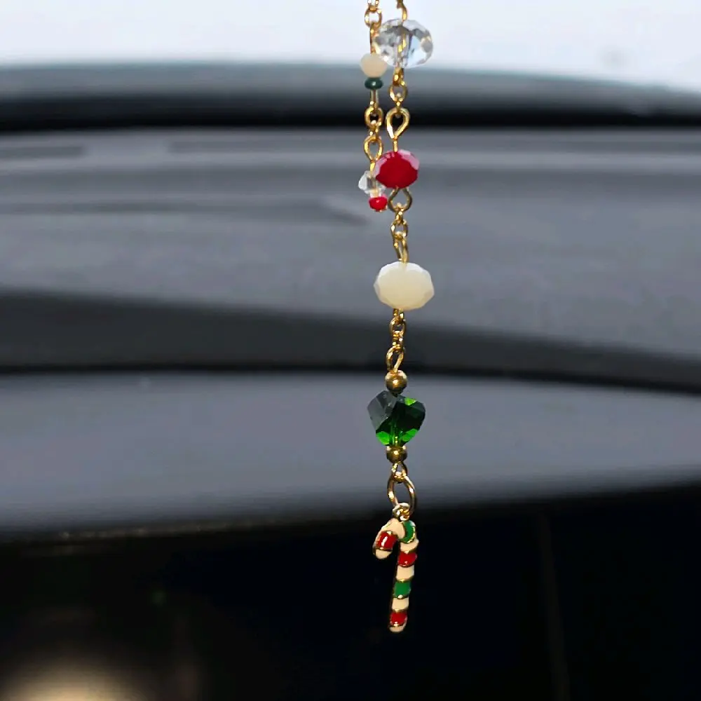 Handmade Christmas candy cane car charm. With gold green and red details. For rear view mirror!
