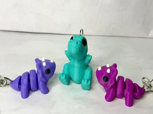 Dinosaur Keychain, articulating keychain, trex, triceratops, 3D printed keychain, Dinosaur gift, Pink Dino, 3D Printed Accessory, Fidget