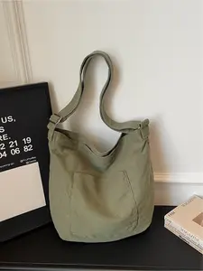 Lazy style, Minimalist tote bag, large capacity with simple silhouette, front pocket design, adjustable wide shoulder straps, can be worn on one shoulder or under the armpit, can hold computers, books, umbrellas, commuting, school, travel