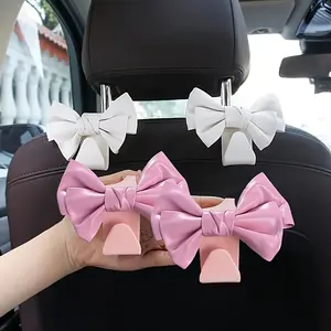 [Stylish Car Seat Hooks] 2pcs Stylish Bow Car Seat Hooks - PU Leather Backseat Storage & Decoration, Fit for All Vehicles, White & Pink Bows for Organized and Chic Interior Accessories, Car Interior Accessories Girls, Car Seat Accessories
