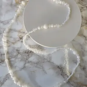 Collar de Obatala Necklace with White Beads and Decorative Elements