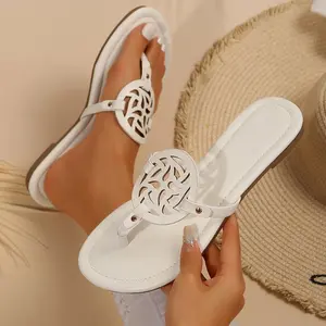 Ladies' black synthetic flat sandals - elegant toe design with metal accents, comfortable slippers and sandals suitable for casual or formal wear
