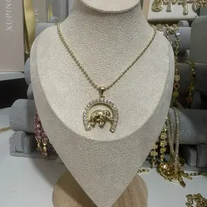 Ballen-licked gold chain with elephant Colgate and erradura/Cadena de oro lamido de balines con Colgate de elefante y erradura